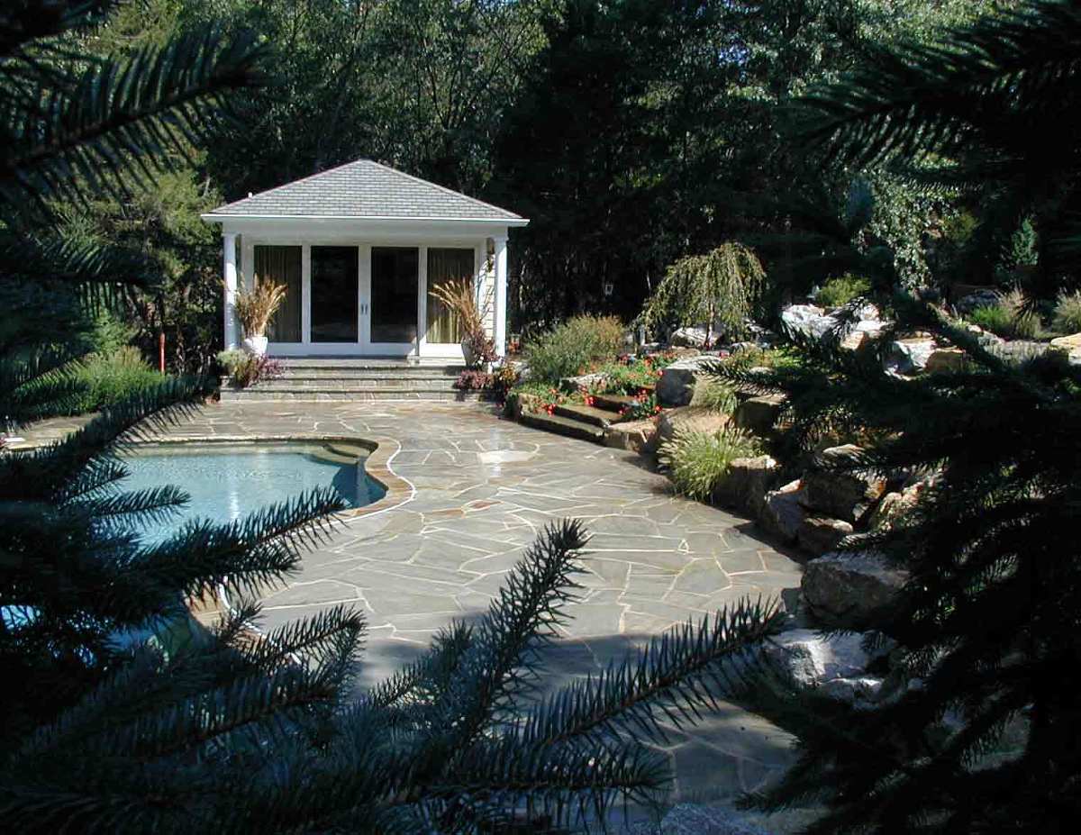 Pool cabana and rock garden